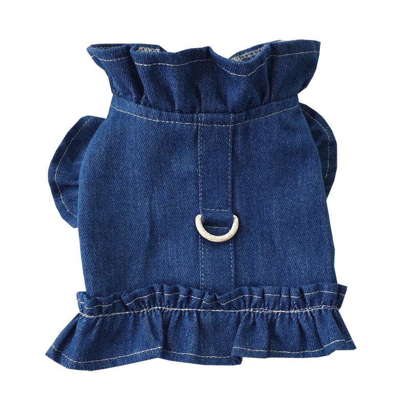 Blue denim dress with ruffled details on a white background