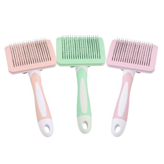 Pet grooming brush for detangling and removing loose fur from dogs and cats