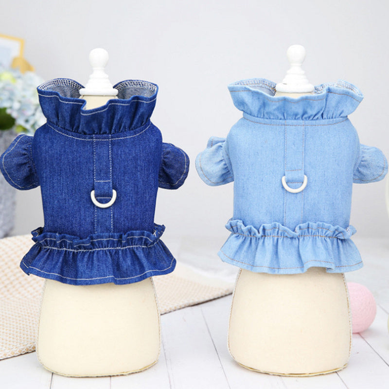 Two denim dresses on mannequins against a light background