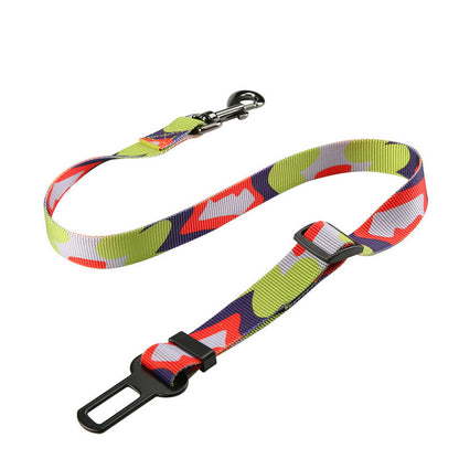 Durable nylon dog seat belt shown connected to a car seat.