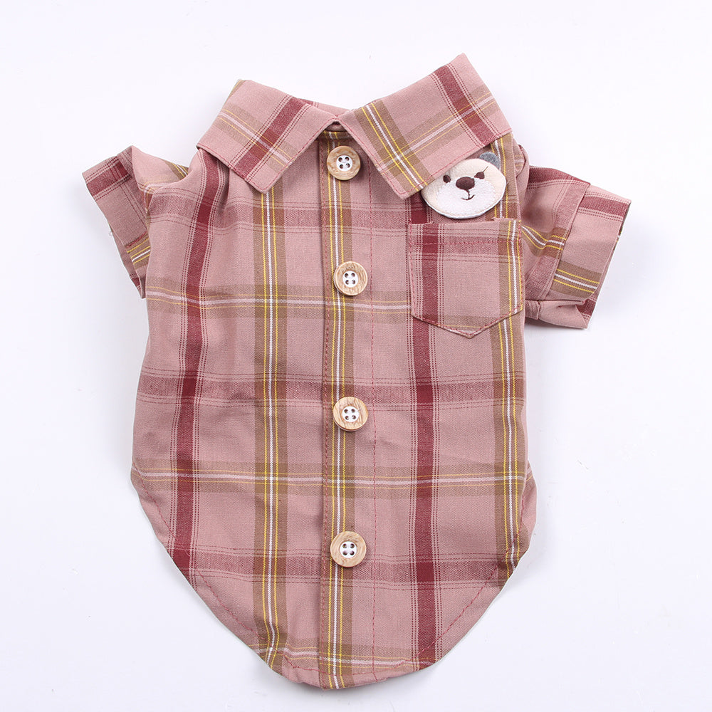 Plaid dog shirt with buttons and a bear tag on a white background