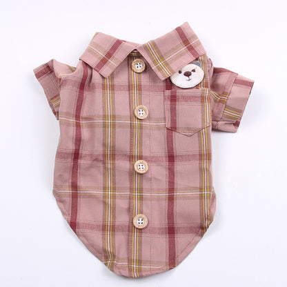 Plaid dog shirt with buttons and a bear tag on a white background