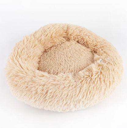Donut cuddler pet bed with self-warming vegan fur