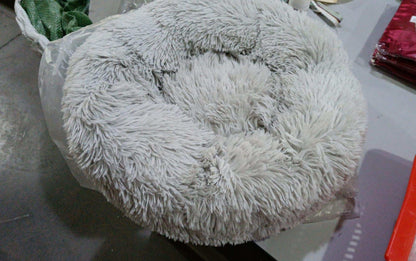 Fluffy pet bed designed for cozy sleep and joint relief