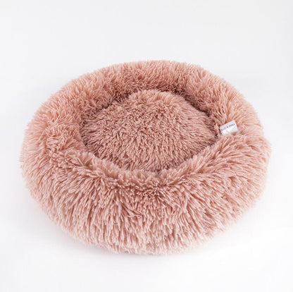 Fluffy raised-rim bed offering neck and head support