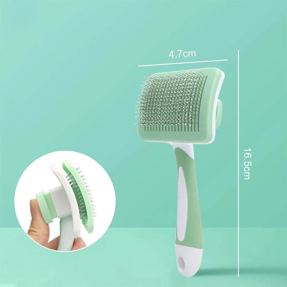 Green and white slicker brush for pets with push-button self-cleaning feature