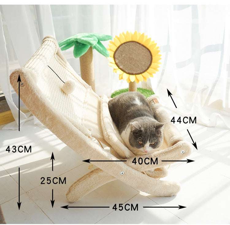 Sunlit cat lounging in a plush hammock-style cat seat with a built-in toy and sturdy wooden frame.