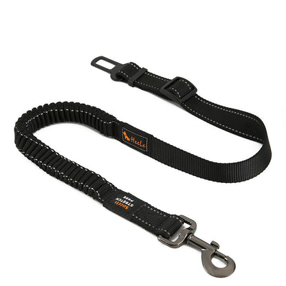 Yellow and black dog seatbelt for car safety with universal buckle attachment.