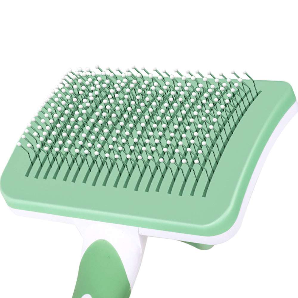 Gentle slicker brush for cats and dogs with safe bristles and easy clean-up