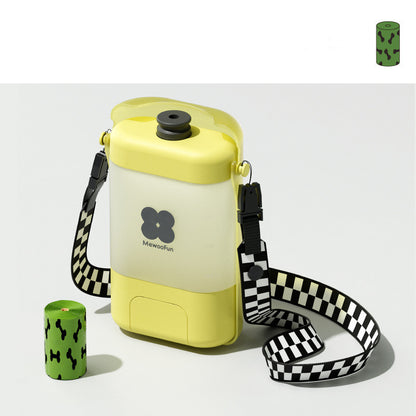 Dog using the foldable tray of the Mewoofun portable water bottle as a drinking bowl.