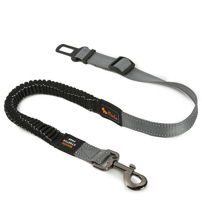 Flexible and adjustable car seat leash for dog safety during travel.