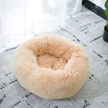 Ultra-soft round nest bed with raised edges for pet comfort
