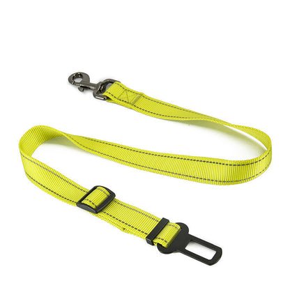 Dog car safety tether in black and yellow nylon with adjustable length.