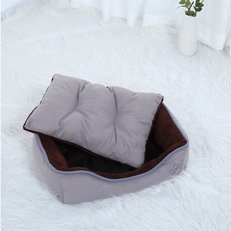 Warm coffee-colored pet bed with a plush cream interior, offering a snug resting spot for pets.