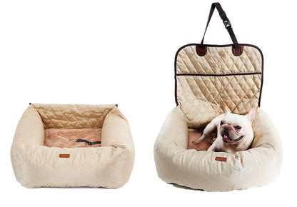 Multi-purpose dog car seat and bed in beige, shown with adjustable carrying straps and quilted backrest.